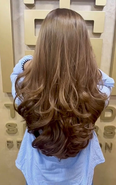 brunette-woman-hair-treatment